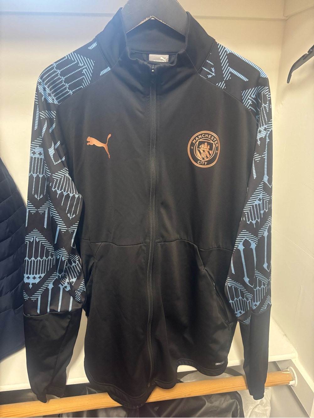 Puma Black Jacket with Light Blue Accents